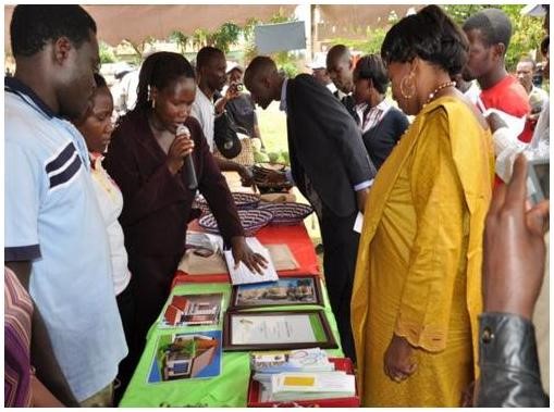 The PHCs displaying some of their proposed plans for their future houses during the World Habitat Day celebrations in October 2012 The PHCs displaying some of their proposed plans for their future houses during the World Habitat Day celebrations in October 2012